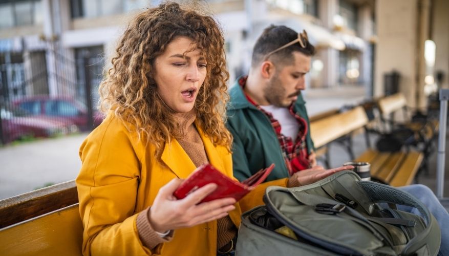 Suprised women looking at her phone - The price is never the price